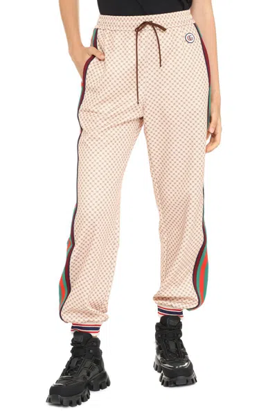Shop Gucci Track-pants With Contrasting Side Stripes In Beige