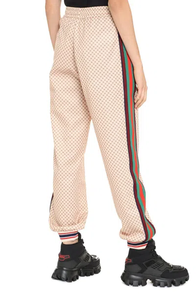 Shop Gucci Track-pants With Contrasting Side Stripes In Beige