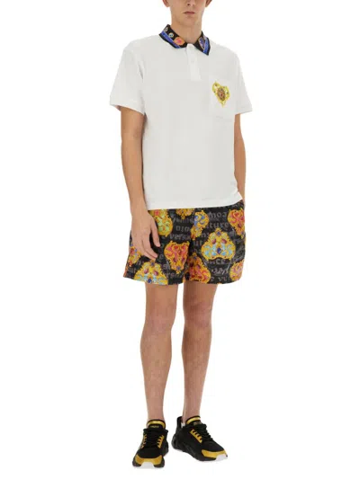Shop Versace Jeans Couture Polo "heart" In White