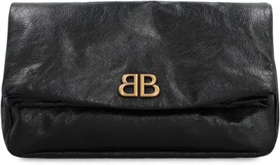 Shop Balenciaga Monaco Leather Clutch In Black