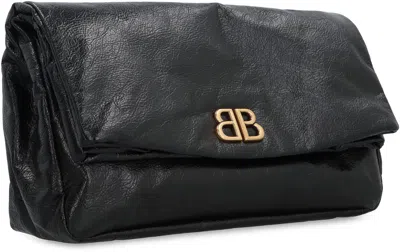 Shop Balenciaga Monaco Leather Clutch In Black