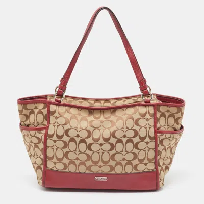 Shop Coach Beige/burgundy Signature Canvas And Leather Carrie Tote