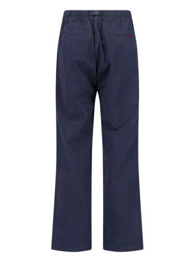 Shop Gramicci Trousers In Blue