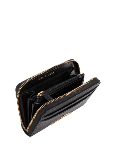Shop Michael Kors Mini Leather Wallet In Black