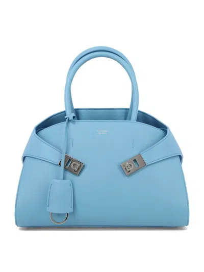 Shop Ferragamo "hug" Handbag In Blue