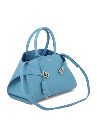 Shop Ferragamo "hug" Handbag In Blue