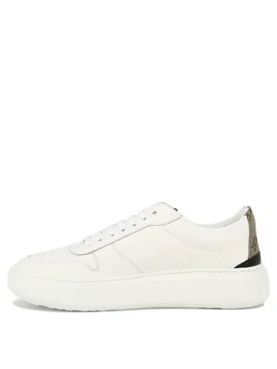 Shop Herno Sneakers With Monogram In White