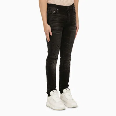 Shop Amiri Faded Black Distressed Skinny Jeans Men