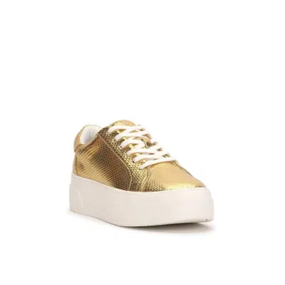 Shop Jessica Simpson Caitrona Platform Sneaker In Gold