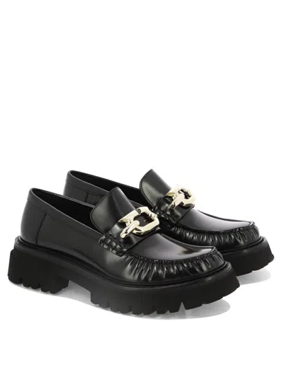 Shop Ferragamo "ingrid" Loafers In Black