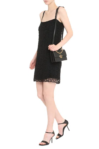 Shop Givenchy 4g Openwork-knit Dress In Black