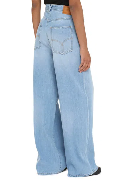 Shop Versace High-waist Wide-leg Jeans In Denim