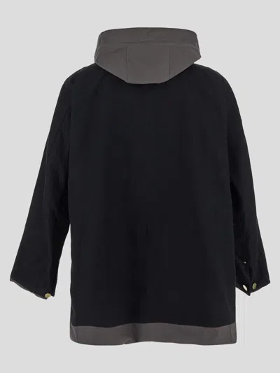 Shop Sacai X Carhartt Wip Coats In Black