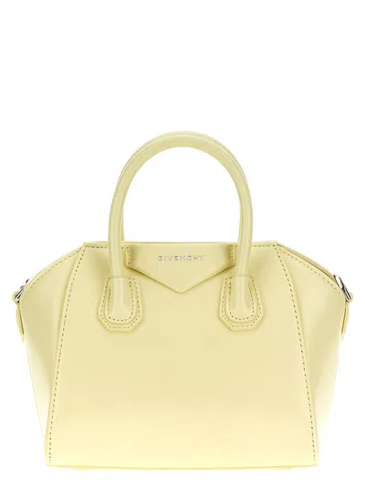 Shop Givenchy 'antigona Toy' Handbag In Yellow