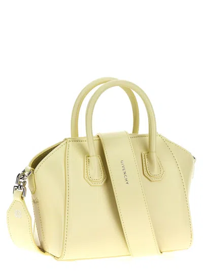 Shop Givenchy 'antigona Toy' Handbag In Yellow