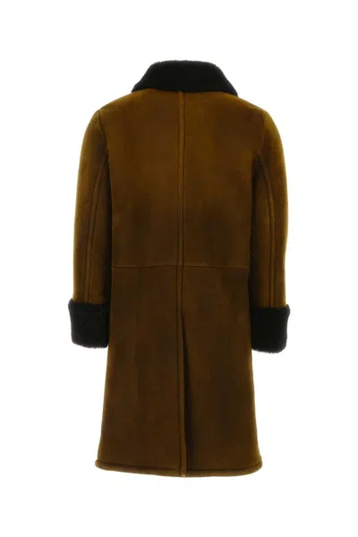 Shop Prada Coats In Brown