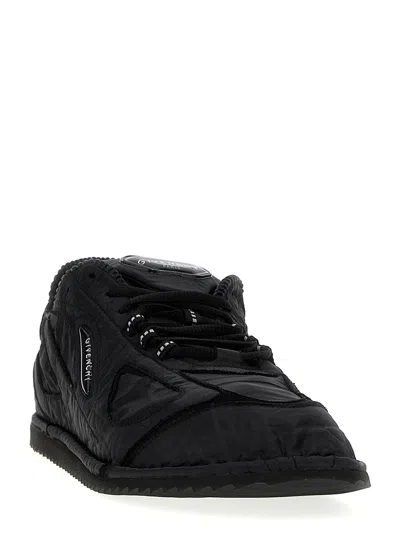 Shop Givenchy Flat Sneakers Black