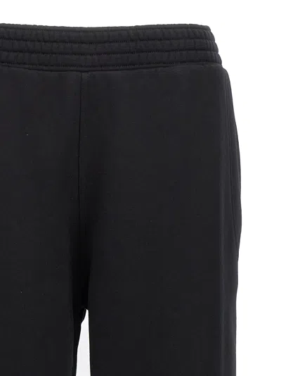 Shop Givenchy Logo Print Joggers Pants Black