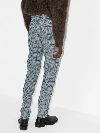 Shop Givenchy 4g-pattern Slim-fit Jeans