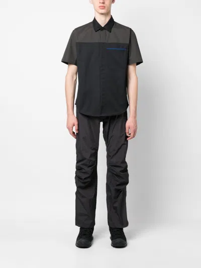 Shop Gr10k Arc Gathered-detail Trousers