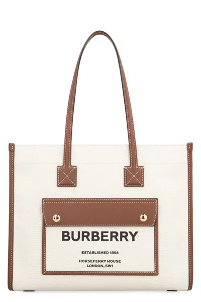 Shop Burberry Freya Canvas Tote Bag In Panna