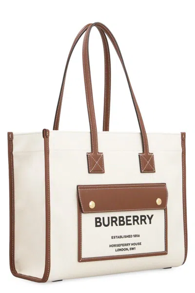 Shop Burberry Freya Canvas Tote Bag In Panna