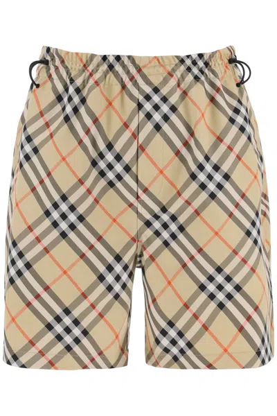 Shop Burberry Checkered Bermuda Shorts In Beige