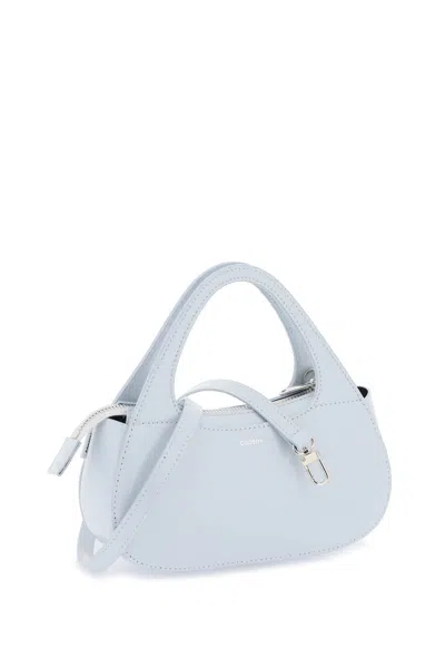 Shop Coperni Swipe Micro Baguette Bag In Shiny Leather In 浅蓝色