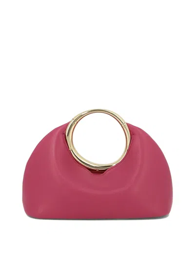 Shop Jacquemus "le Petit Calino" Handbag In 紫红色