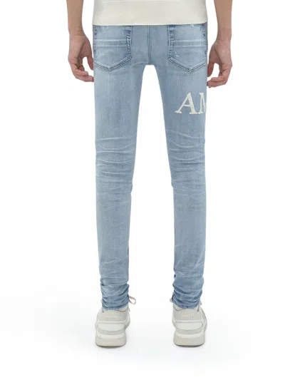 Shop Amiri Men Jeans Mx1 Con Logo Boucle In Blue