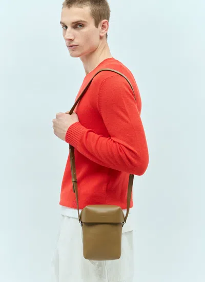 Shop Jil Sander Men Lid Small Crossbody Bag In Brown