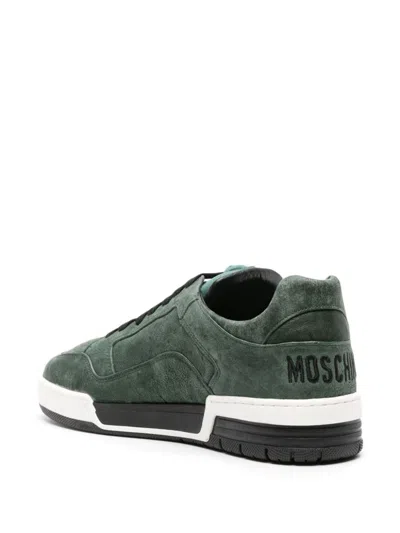 Shop Moschino Sneakers In Green