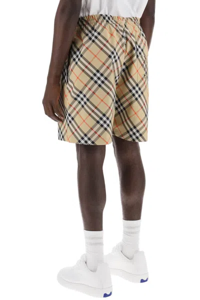 Shop Burberry Checkered Bermuda Shorts