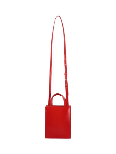 Shop Ferragamo Salvatore  Handbags In Red