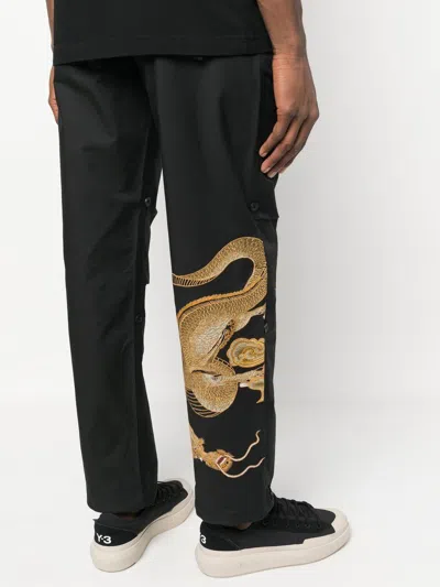 Shop Maharishi Dragon Embroidered Snopants Trousers