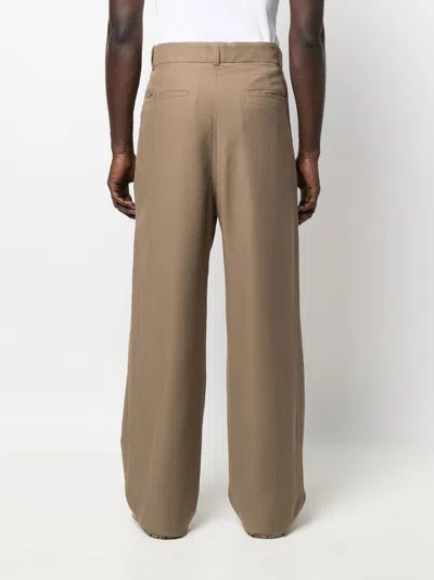 Shop Nanushka Drawcord-waist Wide-leg Trousers