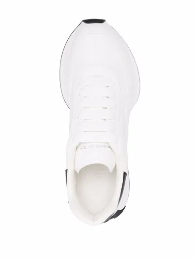 Shop Alexander Mcqueen Embossed Logo Exaggerated-sole Sneakers