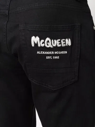 Shop Alexander Mcqueen Embroidered-logo Straight-leg Jeans