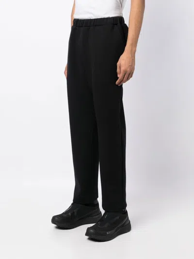 Shop White Mountaineering Four-pocket Track Pants