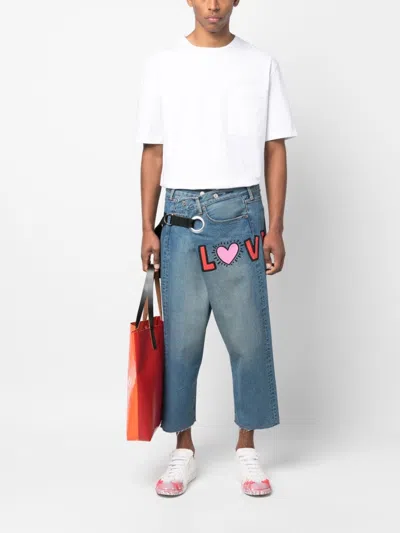 Shop Junya Watanabe Graphic-print Cropped Denim Trousers