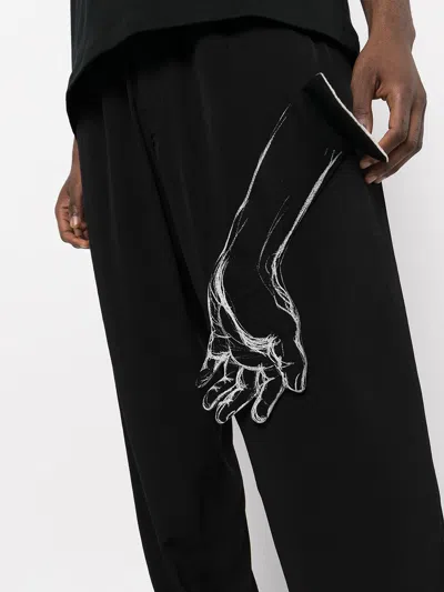 Shop Yohji Yamamoto Hand-illustrated Tapered Trousers