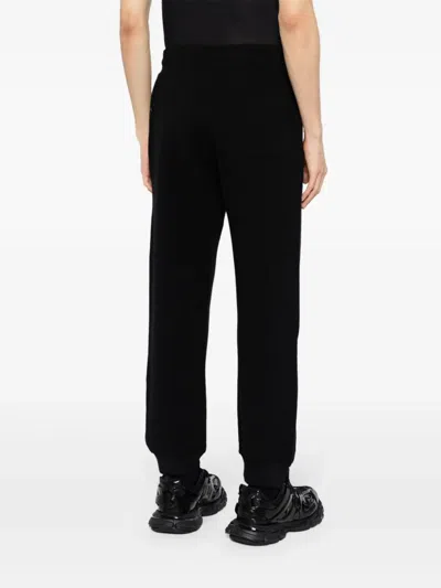 Shop Givenchy Logo-appliqué Elasticated-waist Track Pants