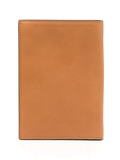 Shop Brunello Cucinelli Logo-debossed Leather Wallet