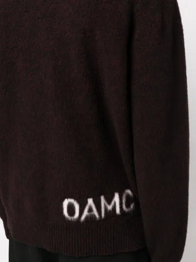 Shop Oamc Logo-knit Roll-neck Jumper