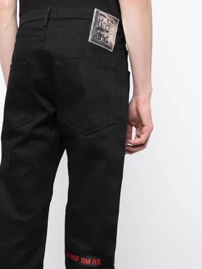 Shop Raf Simons Logo-patch Trousers
