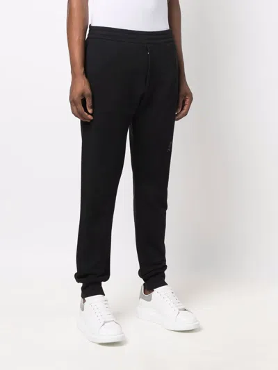 Shop Alexander Mcqueen Logo-print Cotton Track Trousers