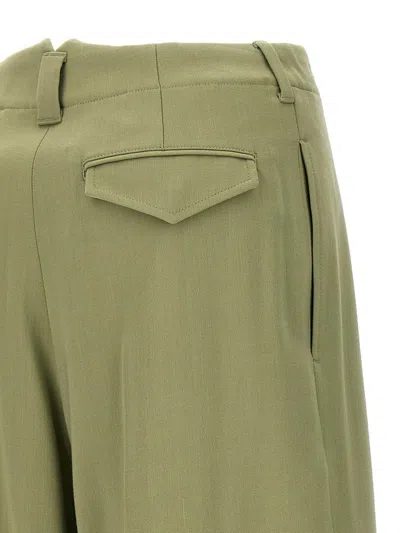Shop Ami Alexandre Mattiussi Ami Paris Pin Tuck Bermuda Shorts In Green