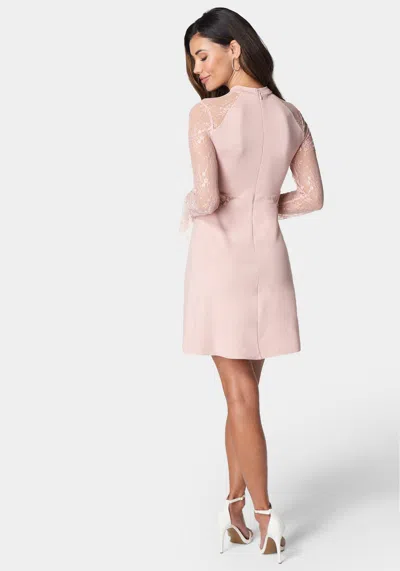 Shop Bebe Lace Bell Sleeve Cutout Dress In Blush