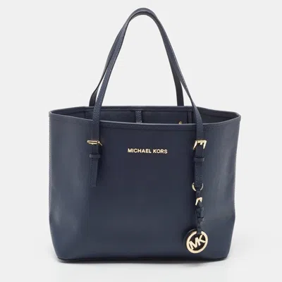 Shop Michael Kors Dark Saffiano Leather Small Jet Set Travel Tote In Blue