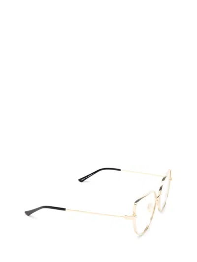 Shop Balenciaga Eyeglasses In Gold